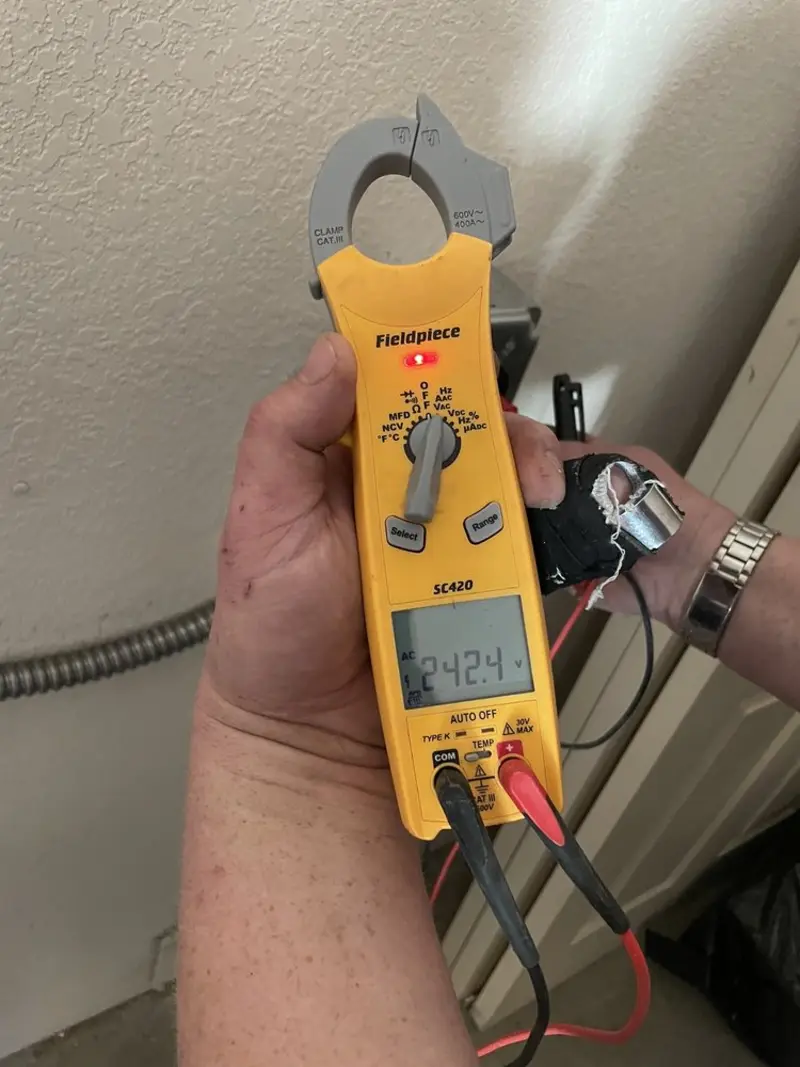 Voltage testing with clamp meter during Electrical Installation Services in Stuarts Draft